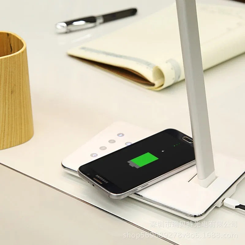 Wireless charging desk lamp with LED lighting in black or white colour options