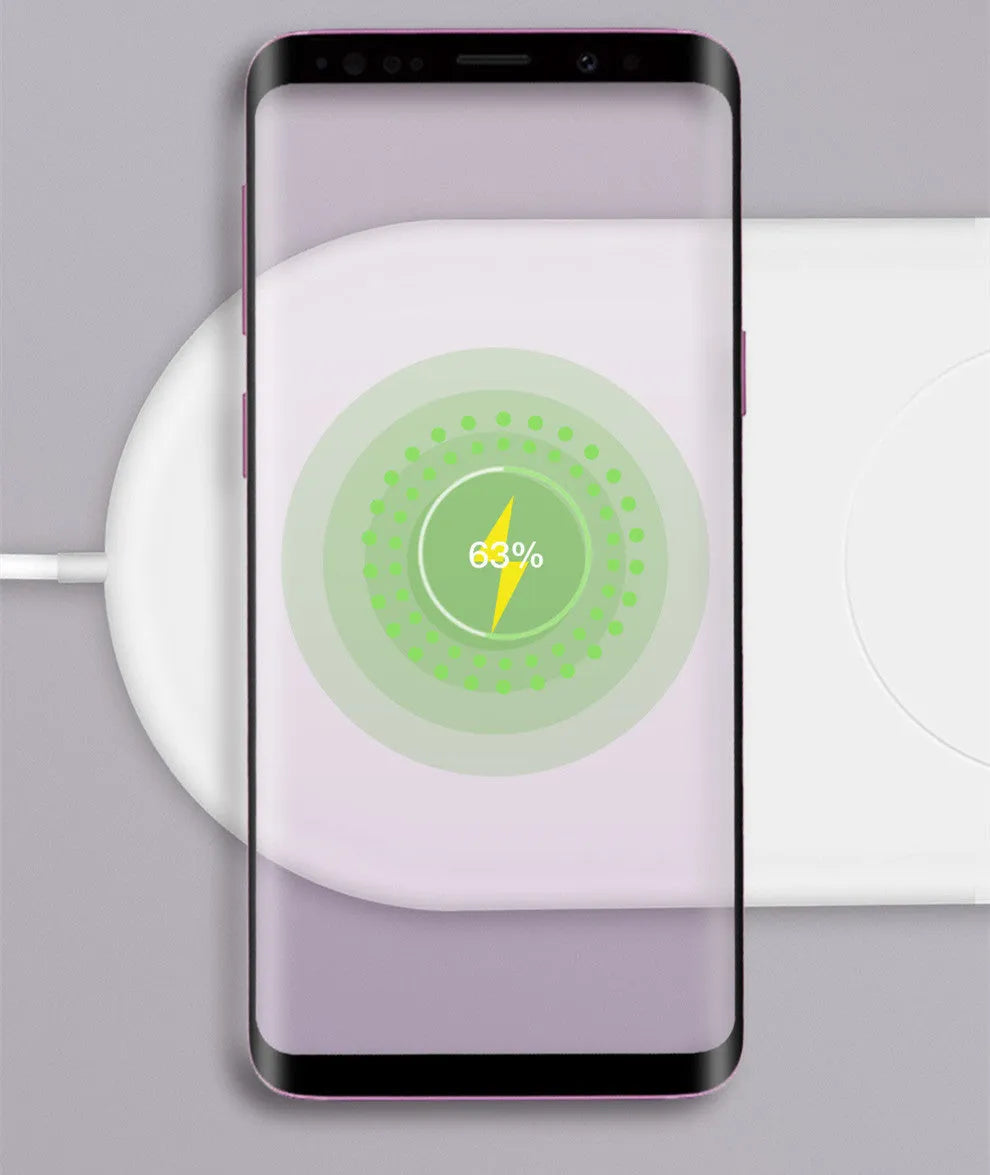White dual wireless charging pad for two mobile phones.