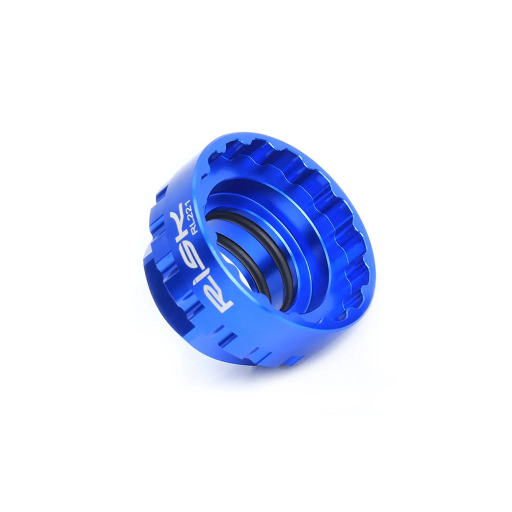 Blue aluminium alloy 12-speed direct mount disc brake caliper removal tool.