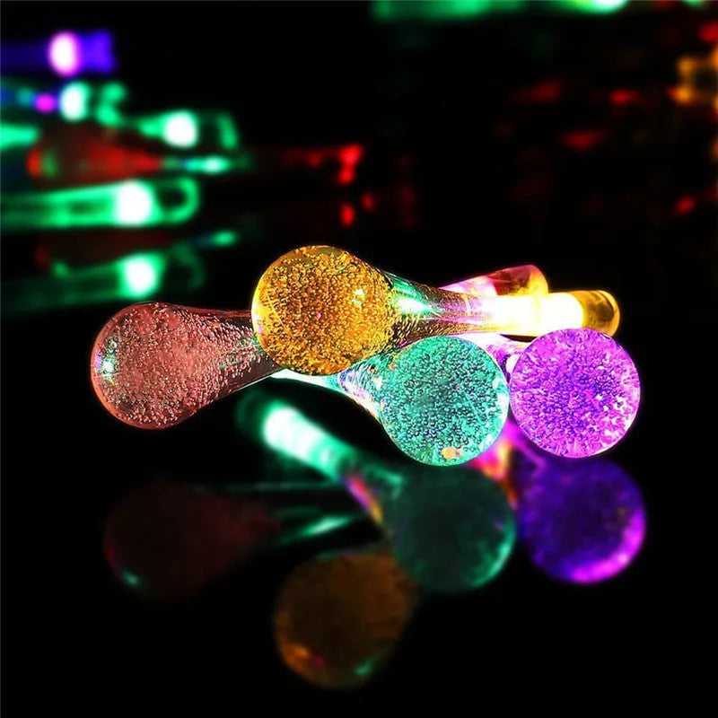 Outdoor solar LED string lights with bubble drop pendants on 6.5 metre waterproof cable