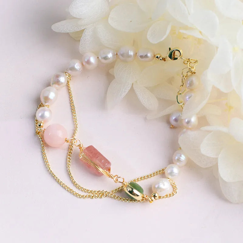 Women's pink freshwater pearl and strawberry quartz crystal bracelet with geometric bead design