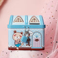 Blue house-shaped tinplate piggy bank for coin saving on a wooden desk