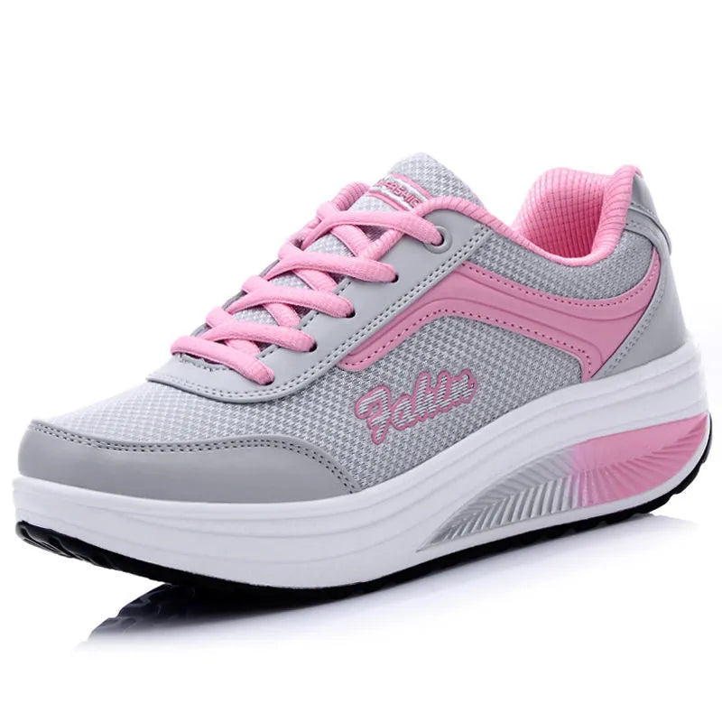 Women's heelless sports shoe in a selection of colours with a middle heel, shown with size scale.