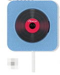 Wall-mounted CD and DVD player unit in white colour with remote control on a table.