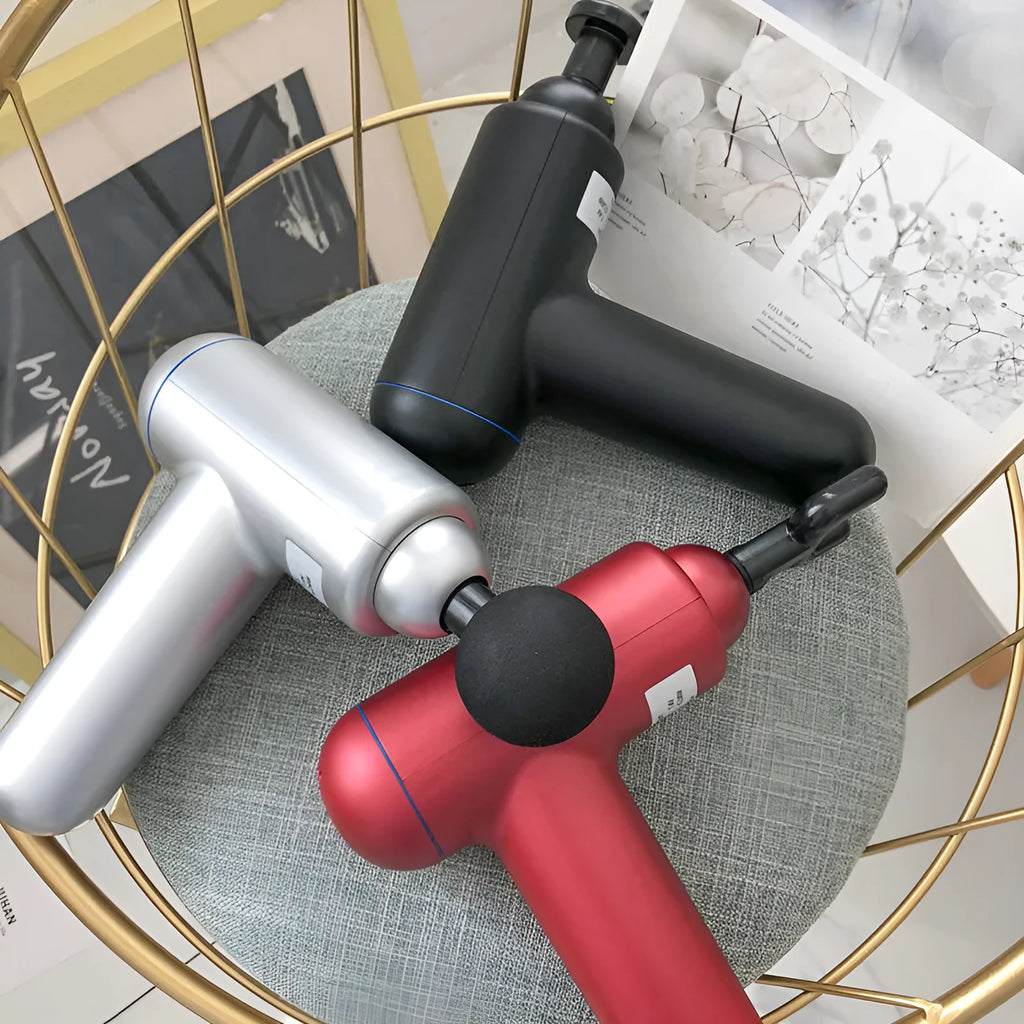 God fascia gun muscle massager in black, red, and grey colour options with USB charging port.