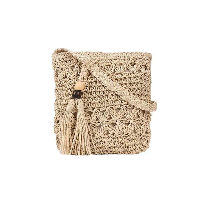 Women's handmade straw woven small crossbody bag in khaki square shape with plain pattern for summer beach use
