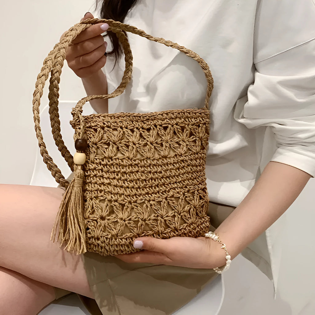 Women's handmade straw woven small crossbody bag in khaki square shape with plain pattern for summer beach use