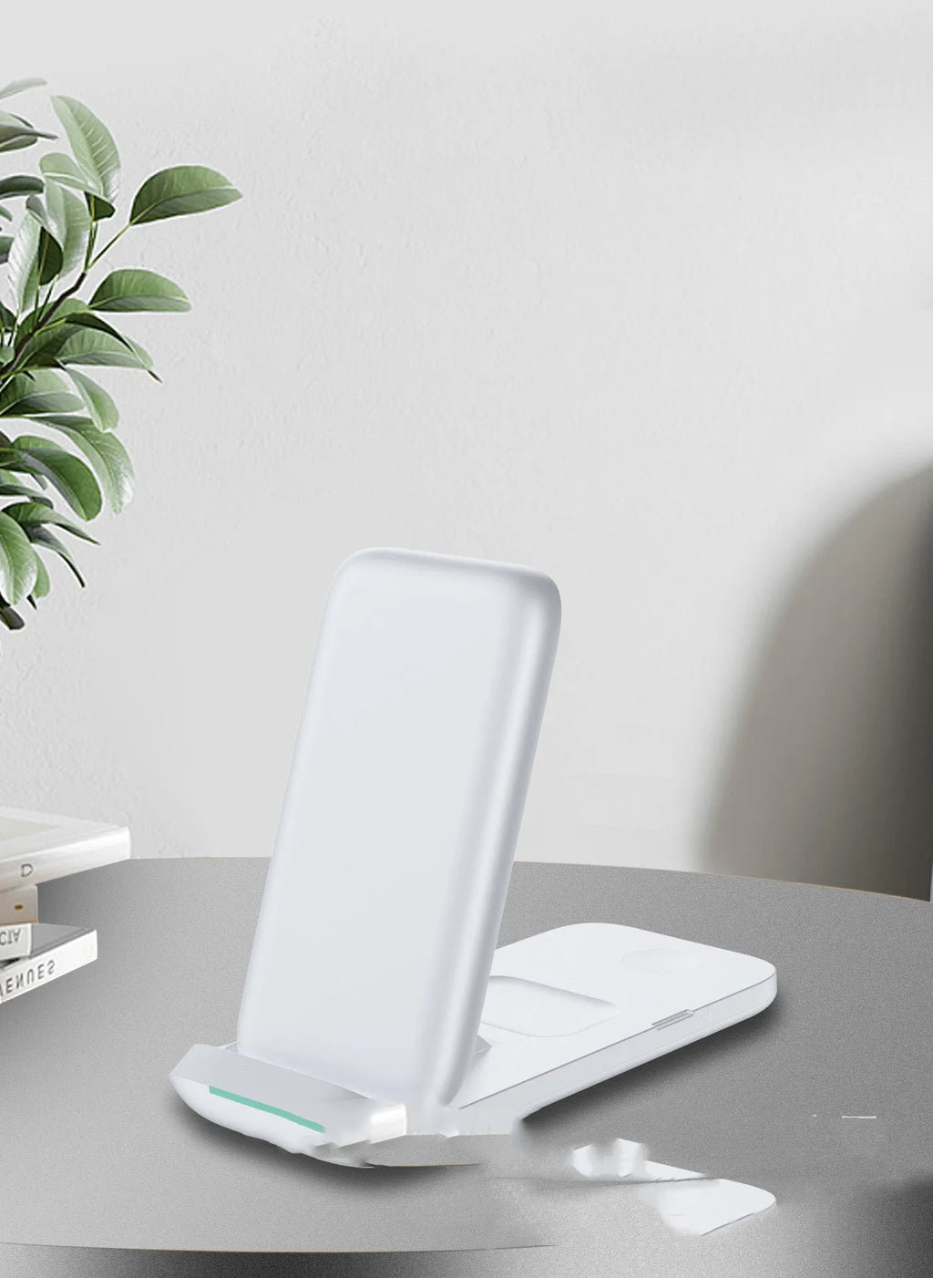 Black foldable three-in-one wireless charger showing three charging surfaces and Type-C port