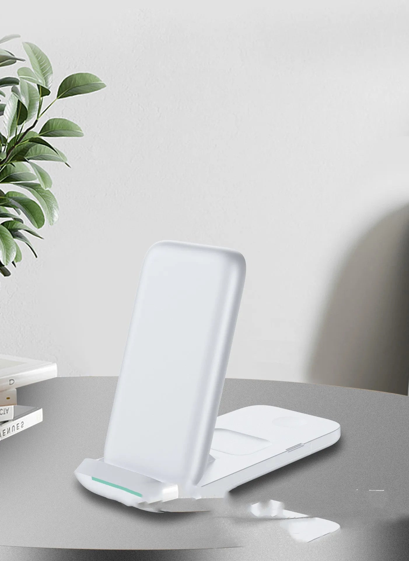 Black foldable three-in-one wireless charger showing three charging surfaces and Type-C port