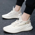 Men's white low-top mesh sports shoes with rubber sole and front laces on a plain background