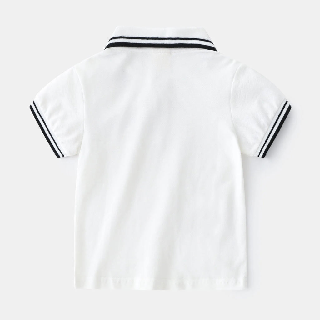 Boys' plain cotton polo shirt with short sleeves and round neck in white or black colours