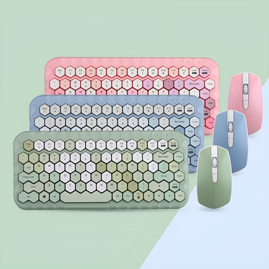 Girl Heart wireless keyboard and mouse set in pink, blue, and green colour options on a desk