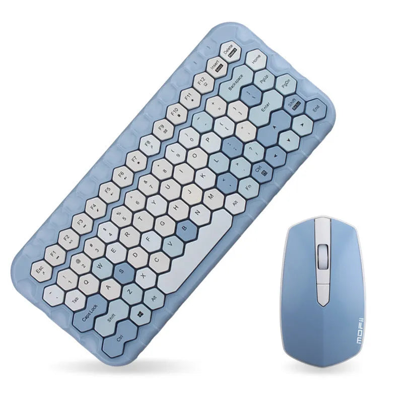 Girl Heart wireless keyboard and mouse set in pink, blue, and green colour options on a desk