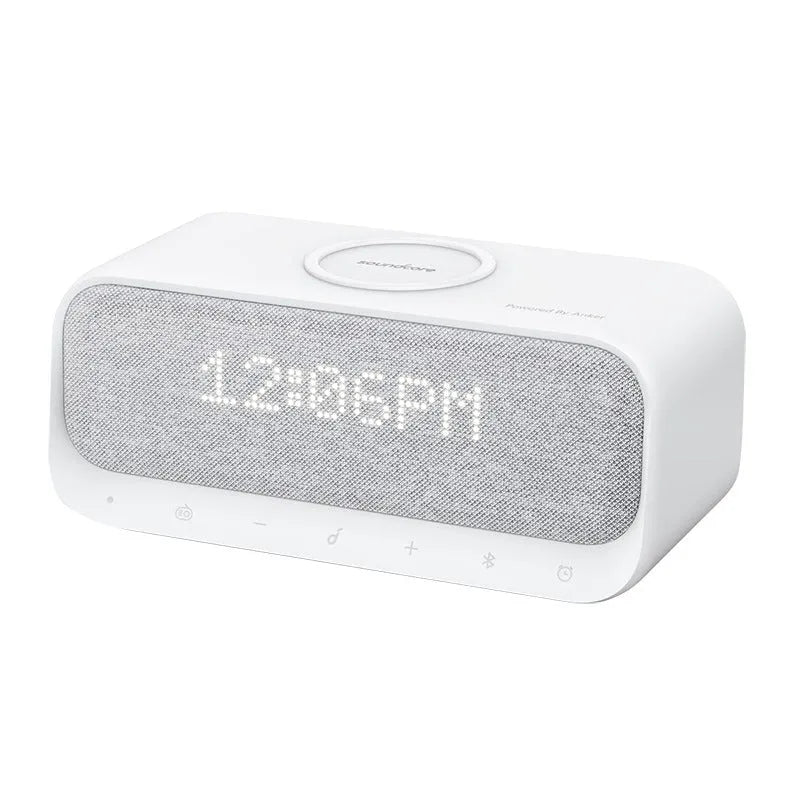 Anker Soundcore white Bluetooth speaker with wireless charging top and digital clock display