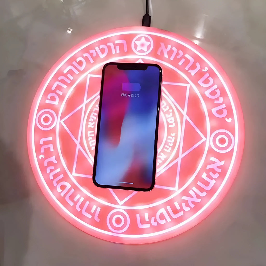 Square wireless phone charger with magic array pattern design glowing blue during charging