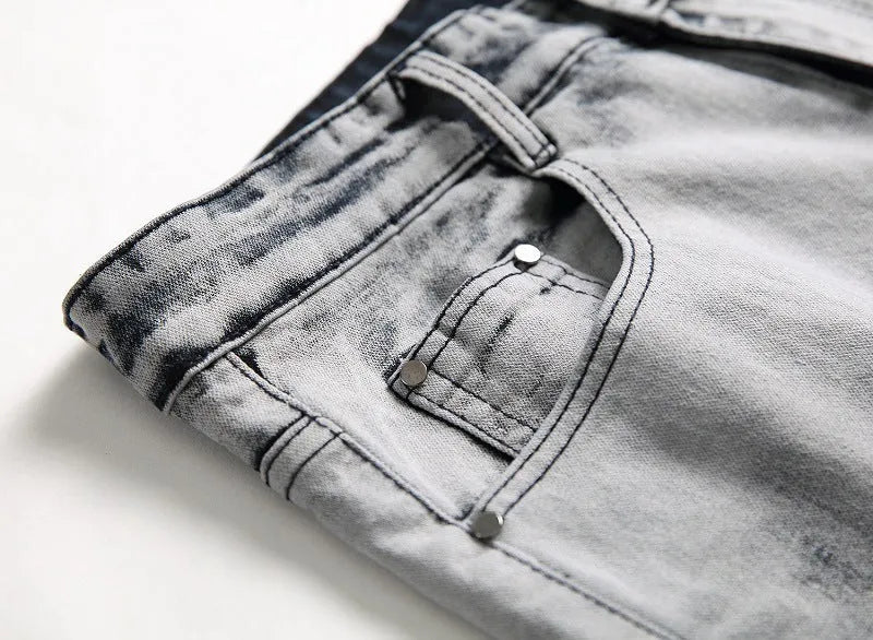 Men's blue and white faded cotton denim jeans with distressed worn finish, straight leg style