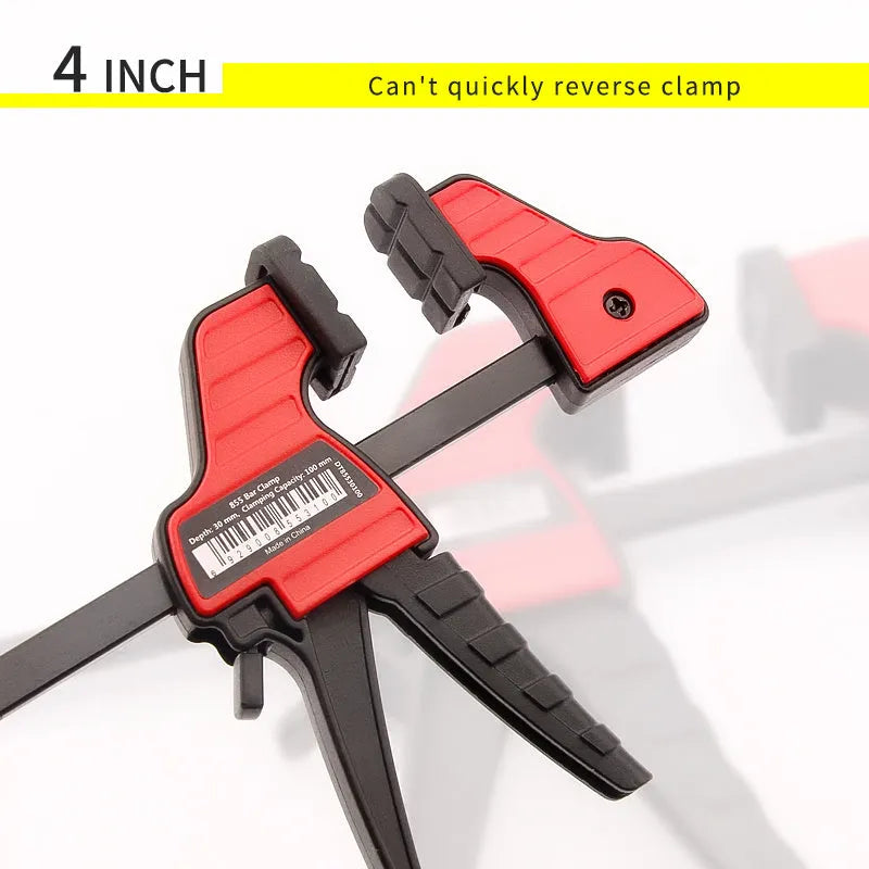 Black engineering plastic woodworking clamp with rubber grip and regression adjustment key