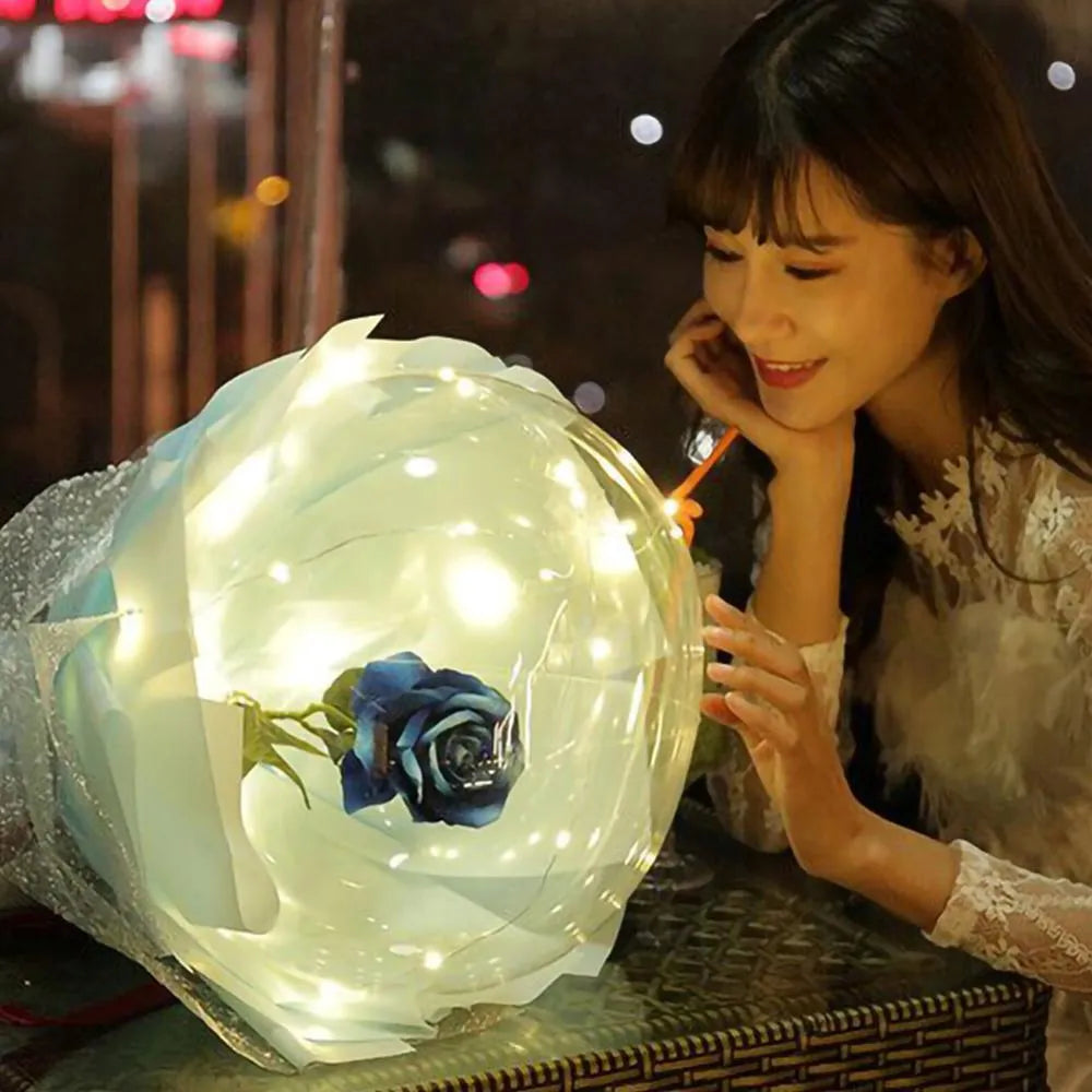 DIY LED luminous transparent balloon and artificial rose bouquet kit for party decoration.