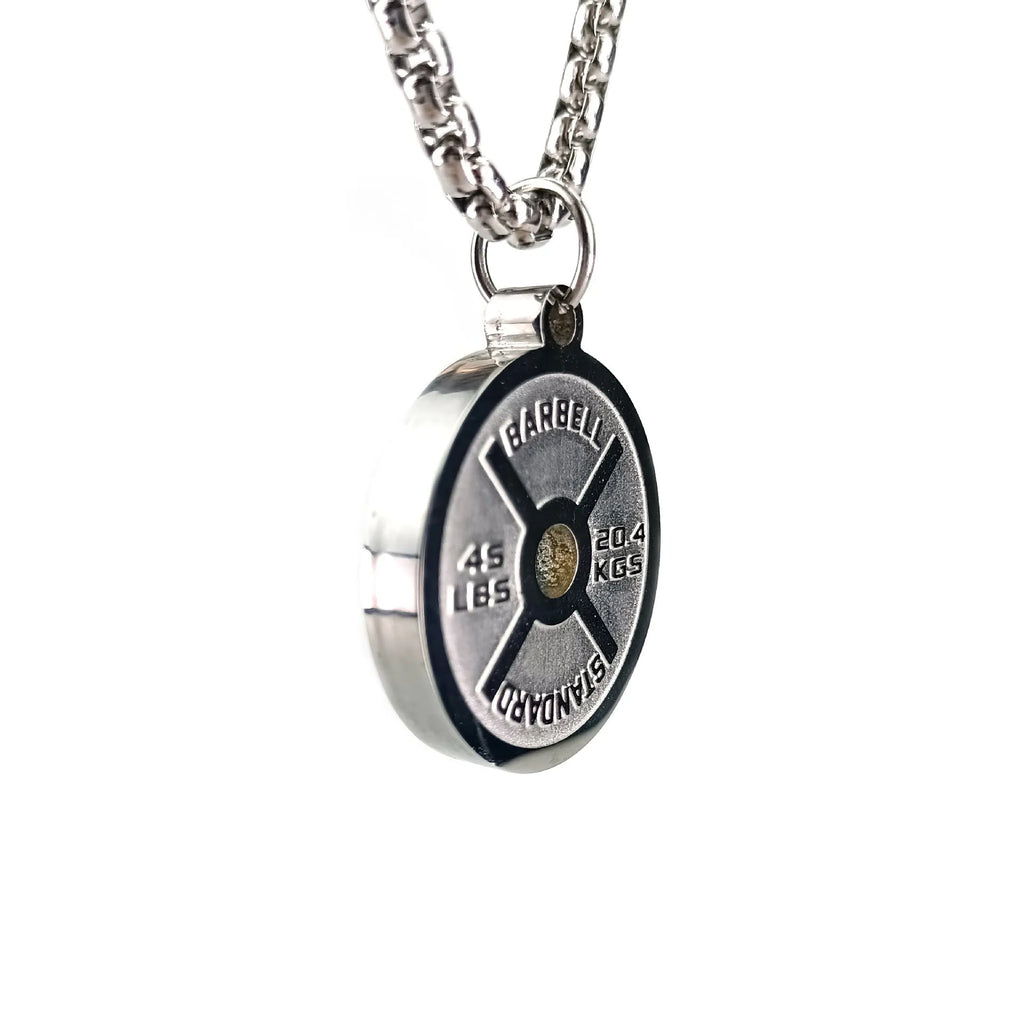 Polished stainless steel barbell disk pendant necklace available in black, gold, and pearl chain styles for fitness fashion