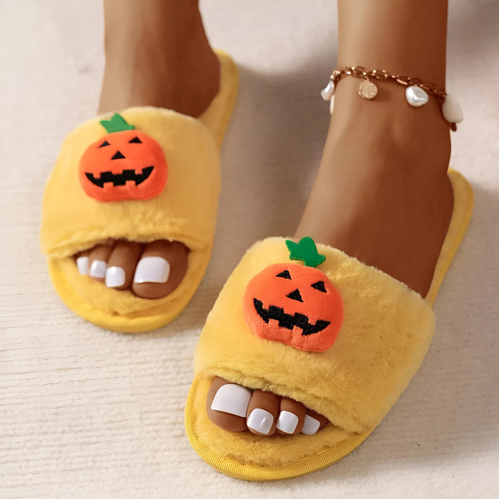 Halloween pumpkin plush slippers in white and yellow with synthetic fur and open toe design