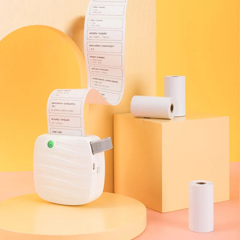 A box containing three rolls of white 57mm wide thermal paper for small printers.