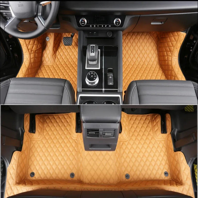 Custom black floor mats installed in a Mitsubishi Outlander footwell.