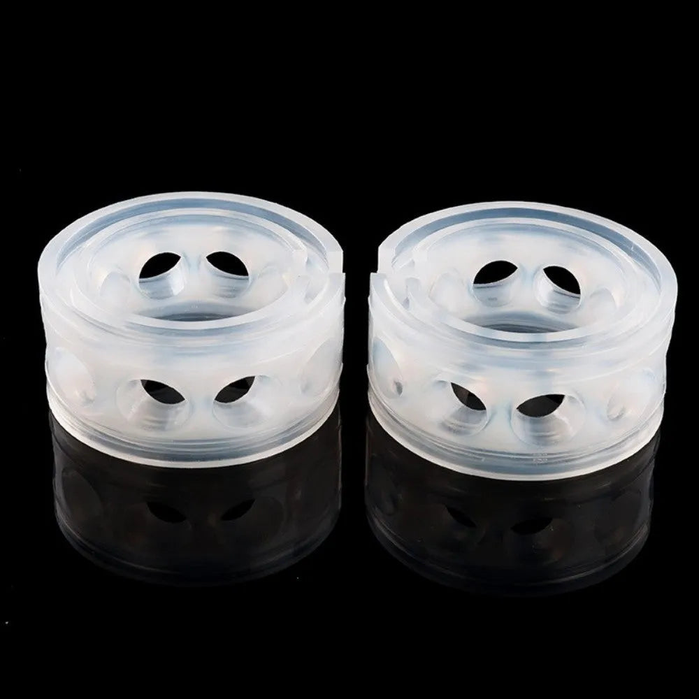 Two transparent rubber shock absorbers for car springs, shown with size measurement diagram.