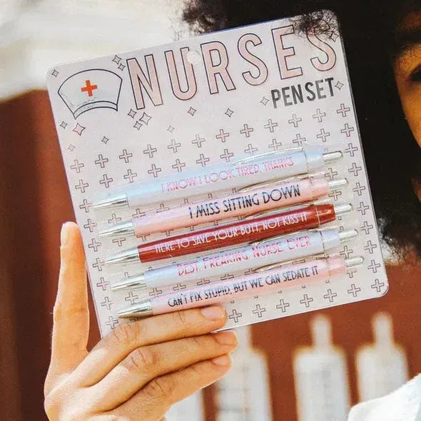 Five nurse theme ballpoint pens with retractable mechanisms and medical humour text