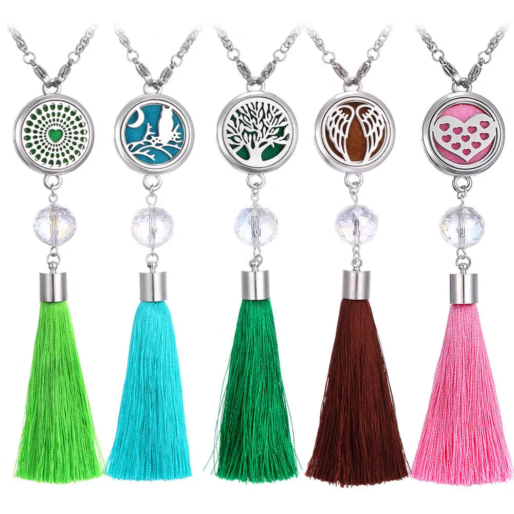 Alloy tassel-style car fragrance pendant with cotton pads hanging from rear-view mirror