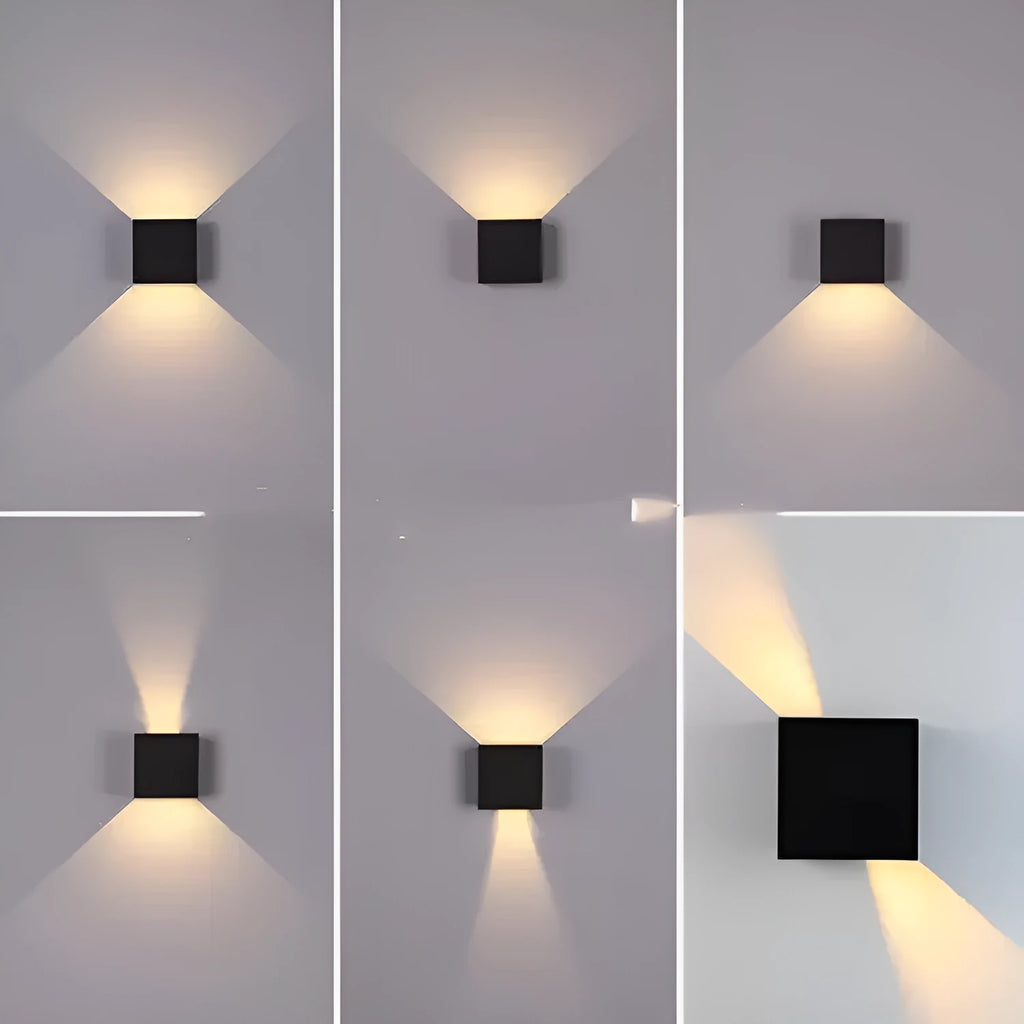 Square black aluminium alloy LED wall lamp mounted on a brick wall, showing 360-degree light emission.