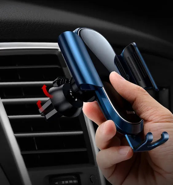 Universal smart car phone bracket with flexible gooseneck arm mounted on a car dashboard