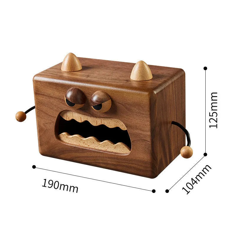 Little Monster cartoon design wooden tissue box in walnut beech finish, 190mm wide.
