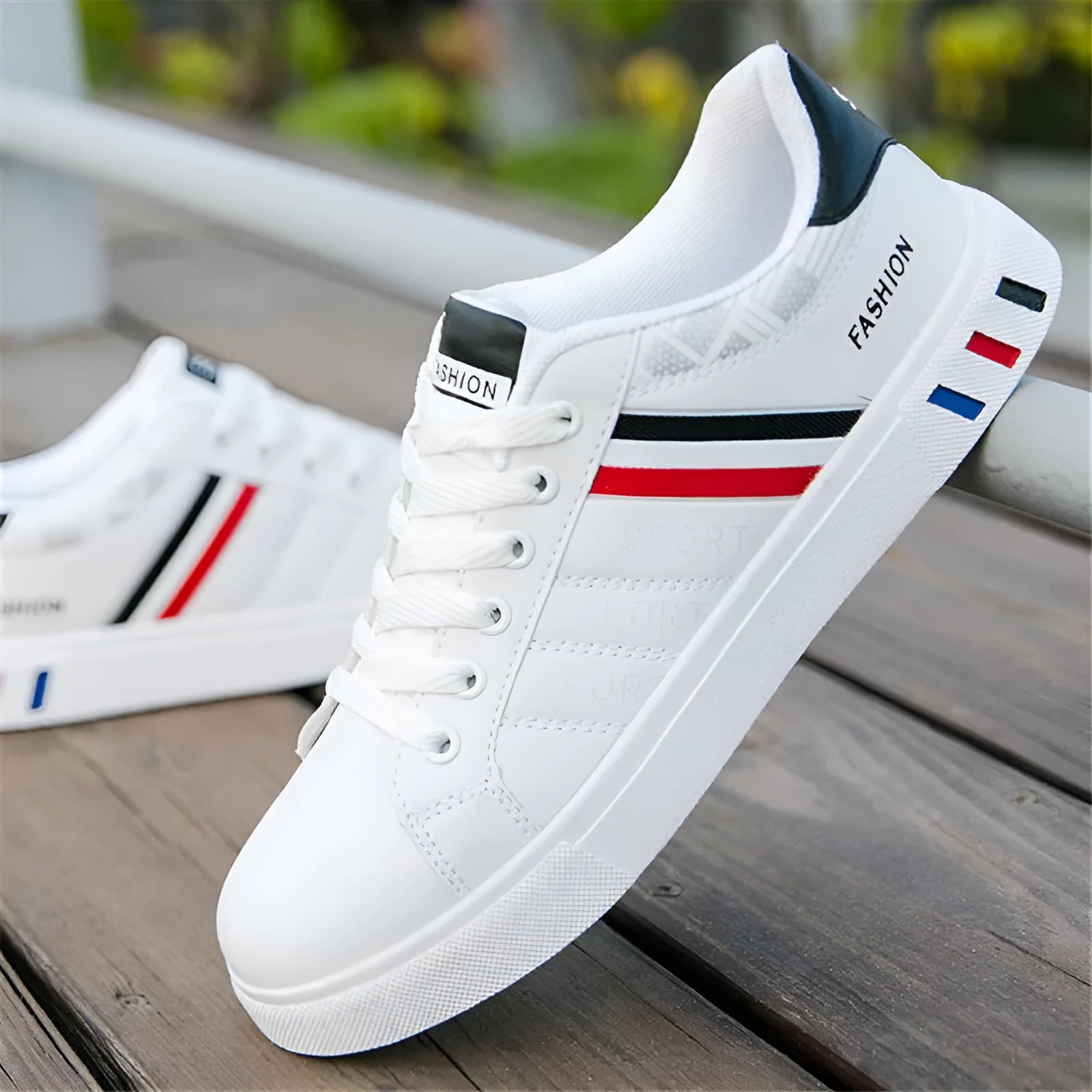 Men's sports trainers in black, grey, and white colours showing size options from 39 to 44.