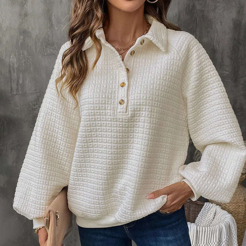 Women's beige textured polo collar long sleeve polyester sweater on a hanger.