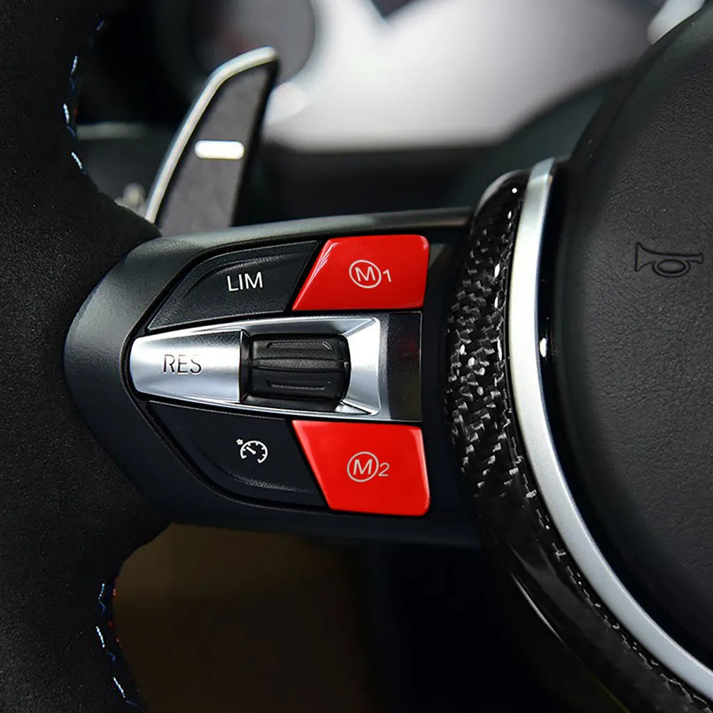 Pair of red and blue BMW steering wheel M1 M2 mode button accessories made from ABS plastic.