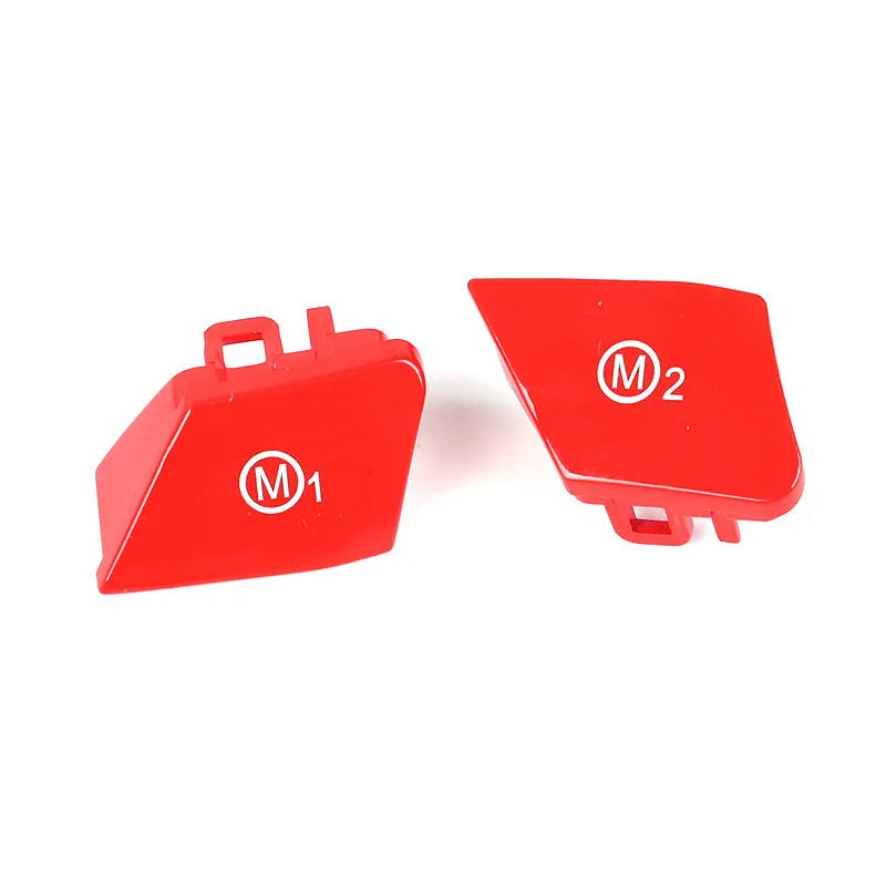 Pair of red and blue BMW steering wheel M1 M2 mode button accessories made from ABS plastic.