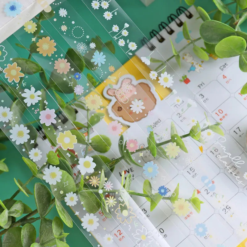 Five rolls of transparent adhesive tape with colourful midsummer daisy cartoon decoration for DIY diary projects