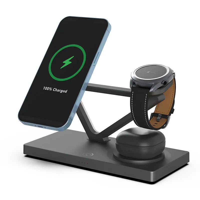 White five-in-one wireless charging station with magnetic phone bracket, circular pad, and watch dock, showing a night light glow.