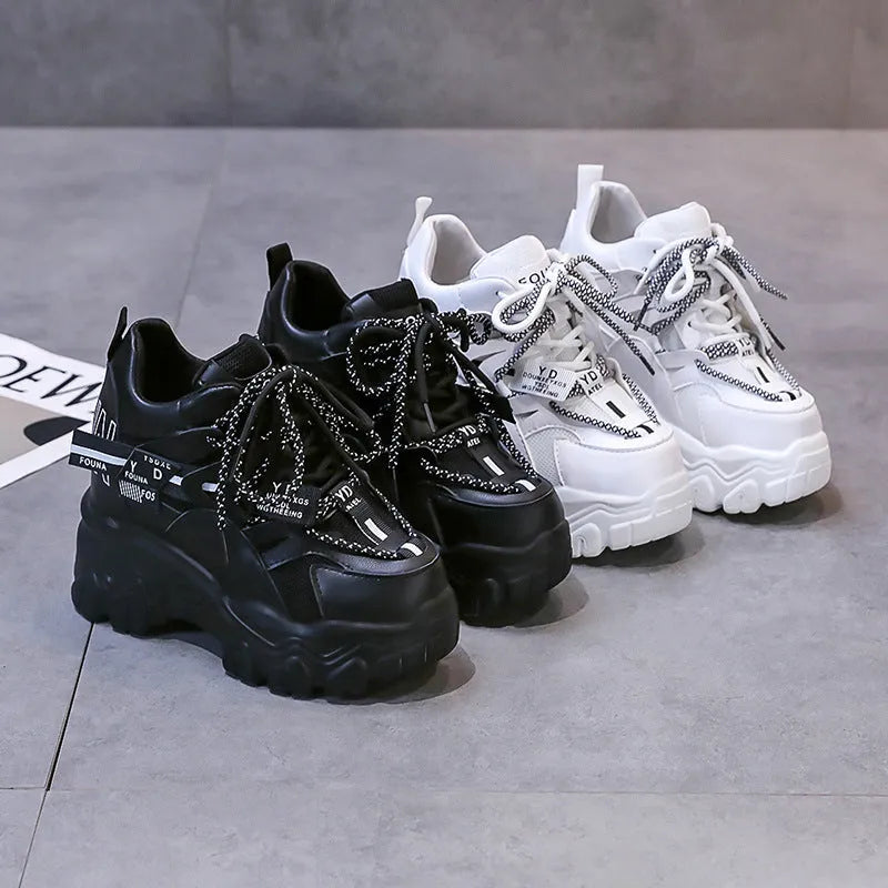 Women's white mesh platform sports shoes with cross-strap design and rubber sole