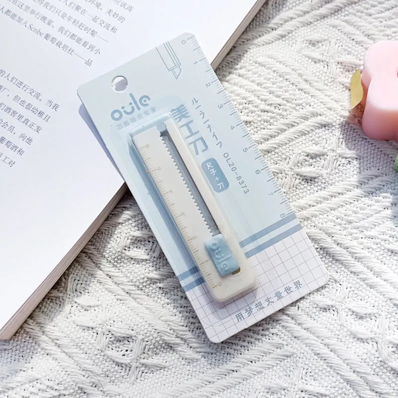 Small plastic art knife for package and box cutting in five colour options