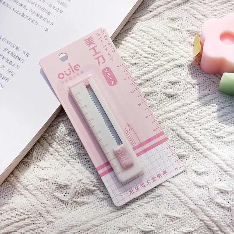 Small plastic art knife for package and box cutting in five colour options