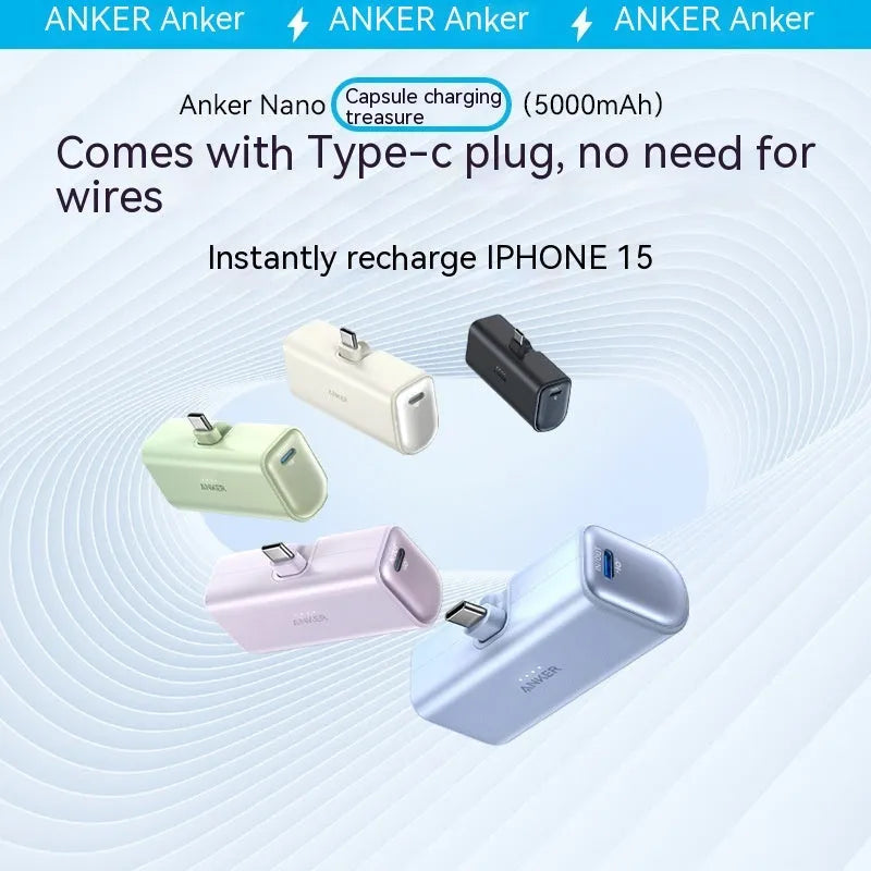 Small black capsule-shaped power bank with a foldable USB-C cable next to it