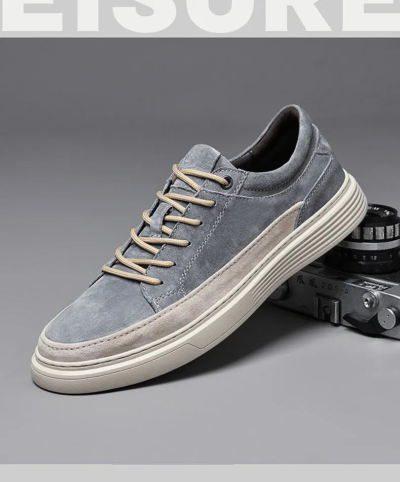 Men's grey casual leather skate shoes with rubber sole and lace-up design