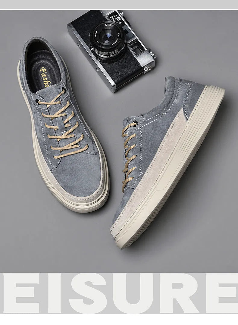 Men's grey casual leather skate shoes with rubber sole and lace-up design