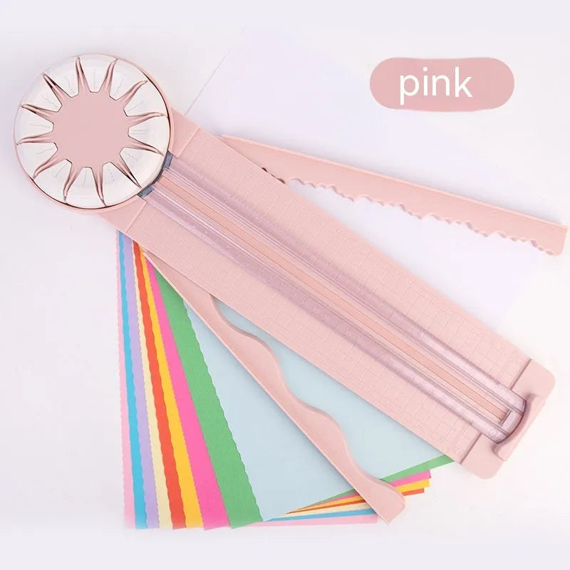 Pink 12-in-1 multifunctional paper cutting machine with plastic construction measuring 46.2cm wide