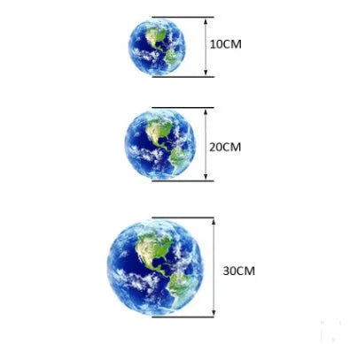 Glow in the dark 3D planet Earth wall sticker in 30cm diameter on a dark blue wall.
