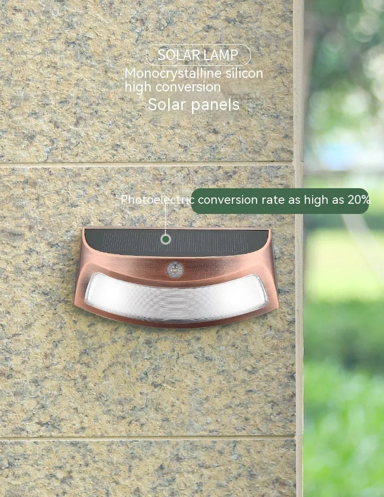 Solar outdoor smiling face wall lamp for garden decoration with IP65 waterproof rating