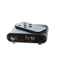 Silver aluminium audio source selector switch unit with front-panel buttons and infrared remote control.