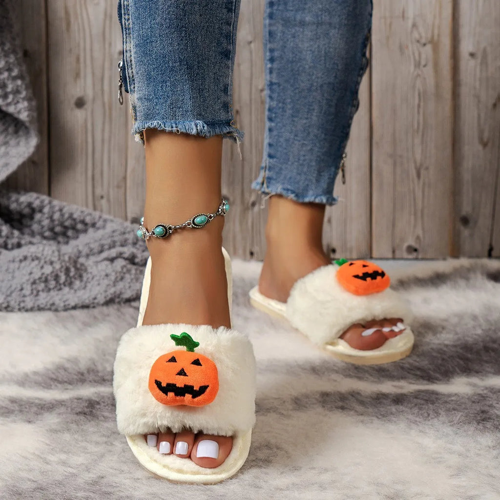 Halloween pumpkin plush slippers in white and yellow with synthetic fur and open toe design