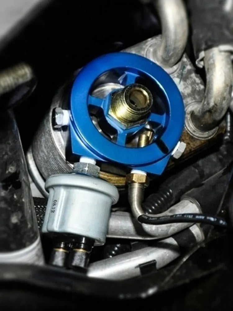 Universal aluminium alloy oil pressure gauge adapter in red, blue, black, gold, and silver colour options.